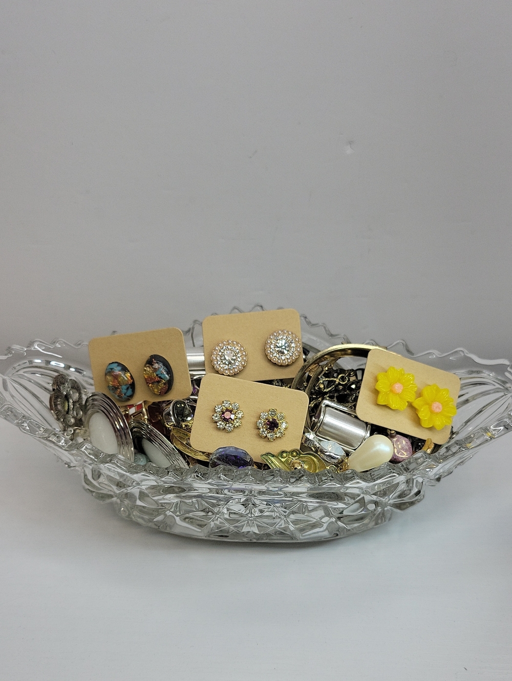 Glass Dish Filled With Earrings